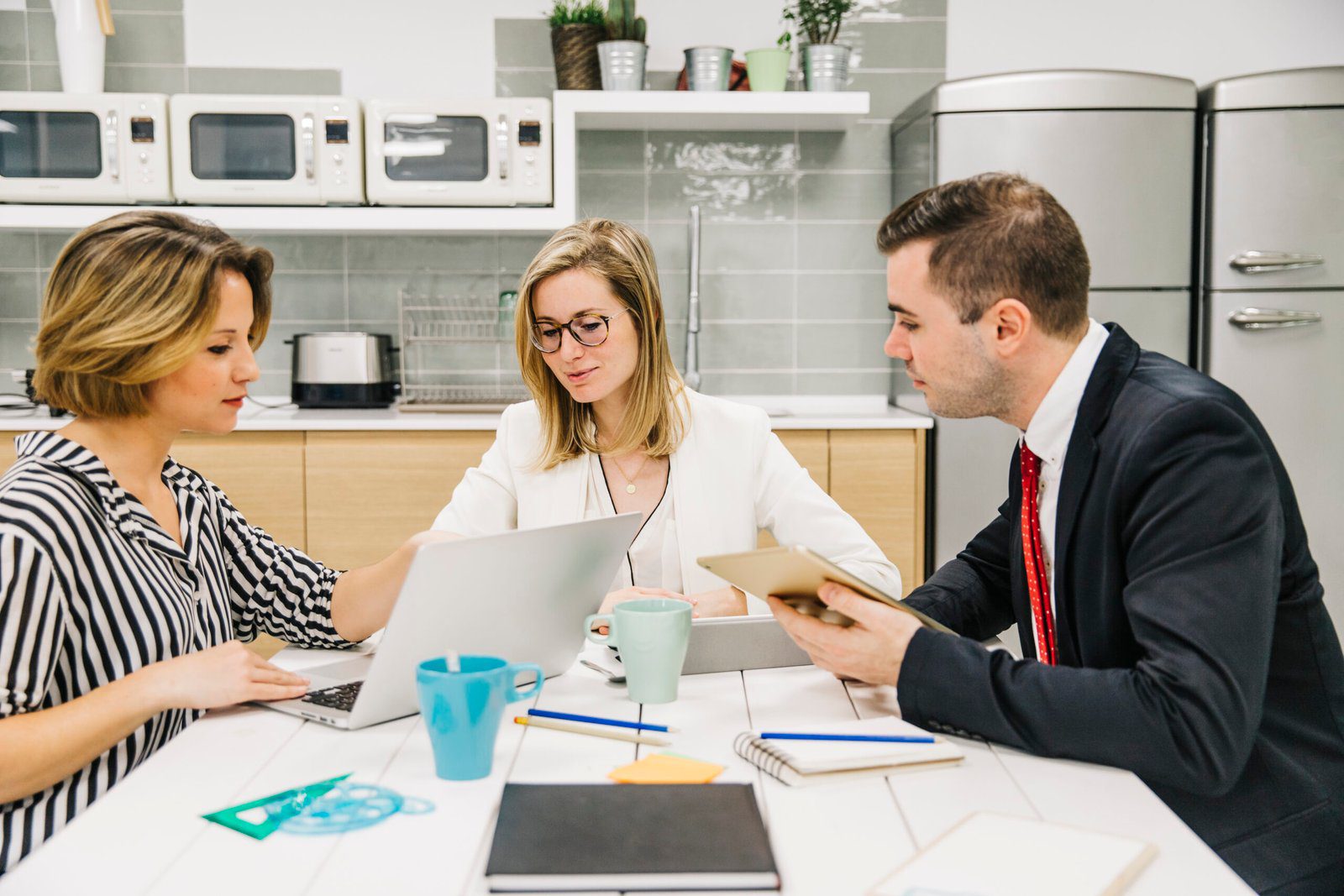 group coworkers discussing business scaled 1